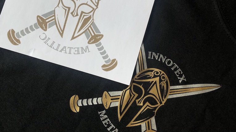 Metallic inks printed onto a black t-shirt